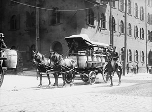 Police On Horseback Guard a Team Driven Wagon during car Strike 1916