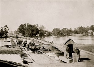 Pontoon bridges across James River at Richmond, Va. April, 1865 1865