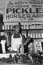 Benny Brodsky at his pushcart stand 1940