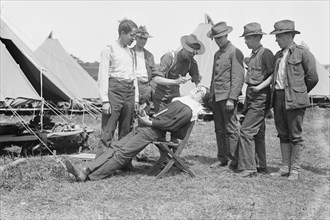 Regimental Barber Shaves the Troops 1908