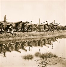 Captured siege guns at Rocketts 1865