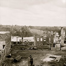 Richmond, Va. Ruins of Richmond & Petersburg Railroad bridge; south bank of the James beyond 1865