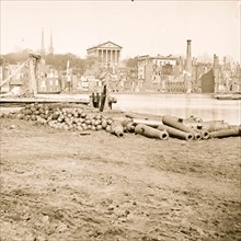 Richmond, Va. View of the burned district and the Capitol across the Canal Basin 1865
