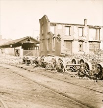 Richmond, Va. Wheels and burned railroad cars near Richmond & Petersburg Railroad station 1865