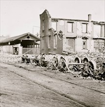 Richmond, Va. Wheels and burned railroad cars near Richmond & Petersburg Railroad station 1865