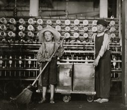 Ronald Webb, twelve year old doffer boy and Frank Robinson, seven year old who helps sweep and doff. 1911