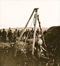 Savannah, Georgia (vicinity). Army engineers removing a 48-pdr. 8-inch Columbiad from Fort McAllister 1864