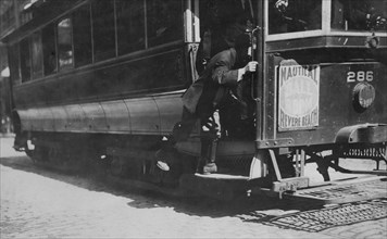 School boy, "flipping cars. 1909