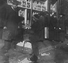Selling celery at market 1917