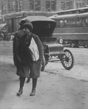 Selling Newspapers at 12:30 P.M., between school hours, on Main Street. 1910