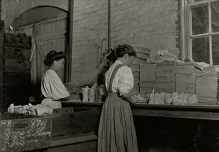 Seneca Glass Works, Morgantown, W. Va. Girls wrapping and packing.  1908