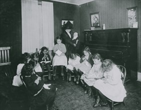 Sewing class in Sprague House Settlement Providence, R.I. 1912