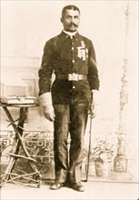 Sgt. Brent Woods, full-length portrait, standing, facing slightly right 1900