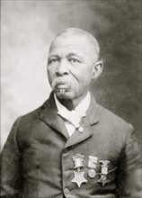 Sgt. John Lawson, head-and-shoulders portrait, facing slightly left 1900