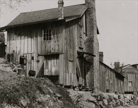 Some of the workers in the Rome (Ga.) Hosiery Mill live in shacks like these.  1913