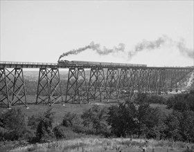 Steam Train passes over Valley Trestle Bridge 1900