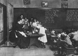 Steamer Glass in Hancock School, Boston. Immigrant children. 1909