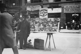 Street Vendor Sells Christmas & New Years Cards of New York Street