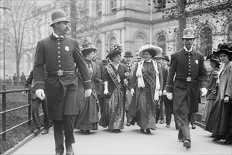 Suffragettes, preceded by policemen, leaving City Hall, New York 1914