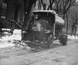 Tank Truck with Snow Plow Cleans the Streets 1922