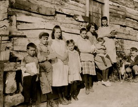 The Mullens children (& some neighbors) ready for school. 1921