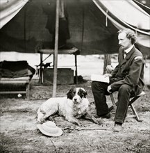 The Peninsula, Va. Lt. George A. Custer with dog 1862