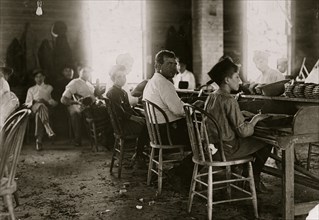 These boys were surely under 14. Cigar makers in Englehardt Co., Tampa, Fla. 1909