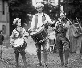 Three Boys March with Instruments on the 4th of July Celebration 1922
