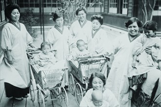 Japanese Mothers with their infants in Perambulators or Baby Carriages