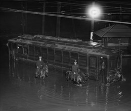 Trolley with Destination of the Treasury Department is partially underwater in Flood 1923