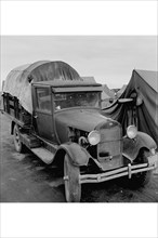 Truck Parked by Tent in FSA site 1939
