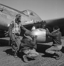 Edward C. Gleed and two unidentified Tuskegee airmen, Ramitelli, Italy, March 1945] 1945