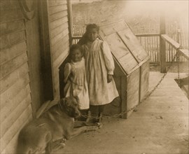 Two African American children with a dog in Georgia 1899
