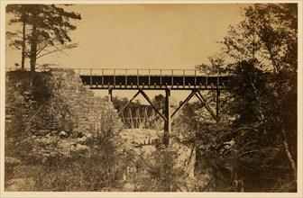 Two trestle bridges over a creek 1863
