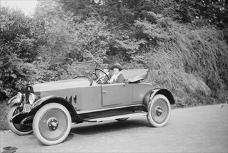 Two women in a Coupe - marked Young