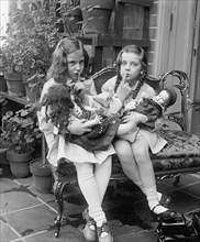 Two Young Girls with Dolls 1925