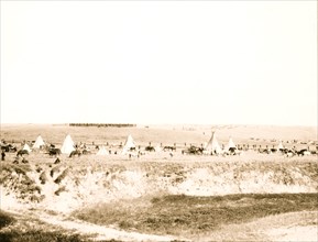 U.S. troops surrounding the Indians on Wounded Knee battle field 1913