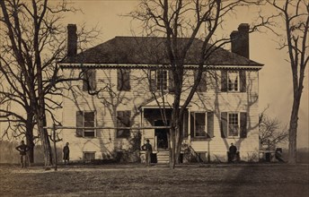 Union soldiers in front of a house 1863