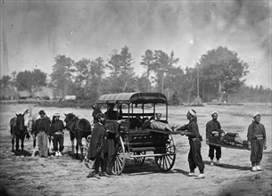 Union Zouaves Bear Stretchers and load men onto a Horse Drawn Ambulance 1863