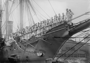 US Navy Sailors on the Newport Training ship lined up on Bowsprit