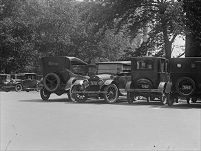 Vehicles parked in street scene 1924 1924