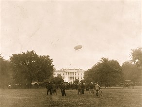 View of air ship above the White House 1906