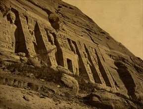 View of facade of the small temple at Abu Sunbul, Egypt, showing sculptures of Hathor and Ramses II. 1880
