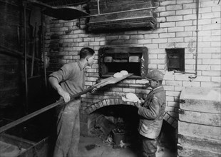 Vincenzo Messina baking bread for father 1917