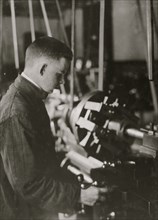 Vocational class. Boring at a lathe. 15 years old 1916