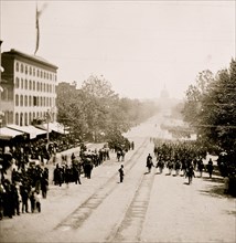 Washington, D.C. Maj. Gen. Horatio G. Wright, staff and units of 9th Army Corps passing on Pennsylvania Avenue near the Treasury 1865