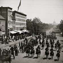 Washington, District of Columbia. Grand Review of the Army [Cavalry] and infantry passing on Pennsylvania Avenue near the Treasury 1865