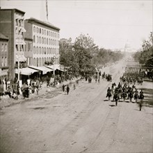 Washington, District of Columbia. Infantry passing on Pennsylvania Avenue near the Treasury 1865