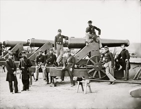 Washington, District of Columbia. Officers and men, 3d Regiment Massachusetts Heavy Artillery by Columbiad guns, Fort Totten 1865