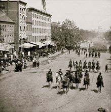 Washington, District of Columbia. The grand review of the Army. Gen. Andrew A. Humphreys, staff and units of 2nd Corps passing on Pennsylvania Avenue 1865